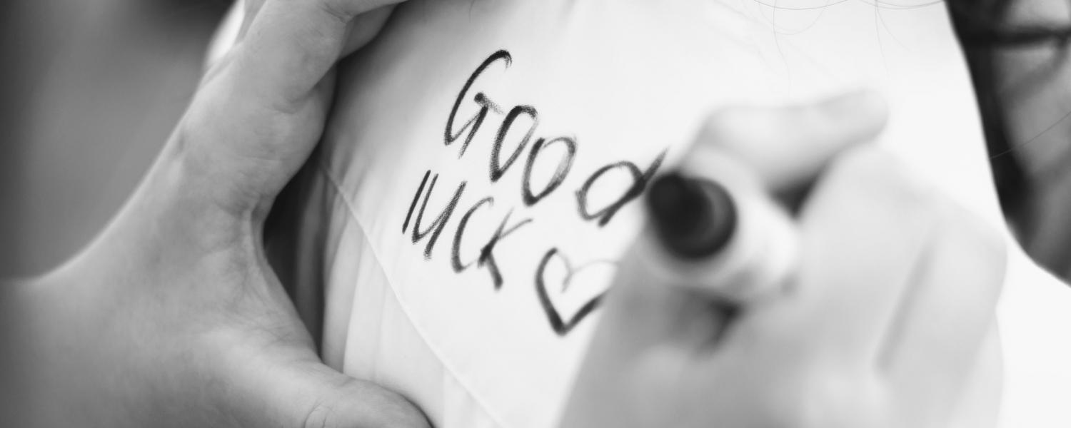 Good luck being written on a shirt at Yr 11 leavers assembly