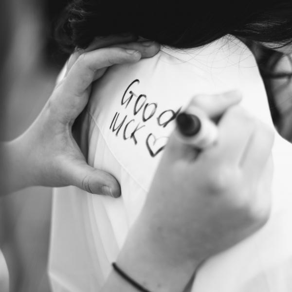 Good luck being written on a shirt at Yr 11 leavers assembly