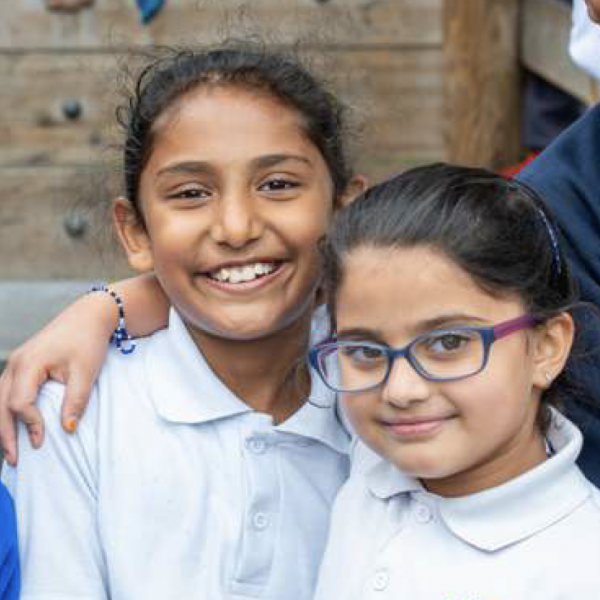 Young students smiling at camera