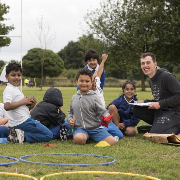Students on a rugby pitch